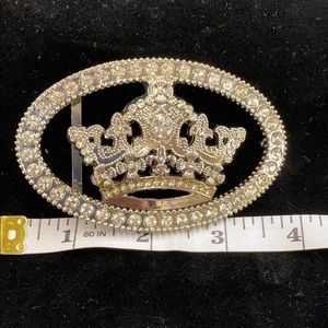 Silver colored metal belt buckles